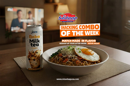 Mi Sedaap noodles with fried egg served beside Jans Boba Milk Tea, promoted as a snacking combo for movie night.