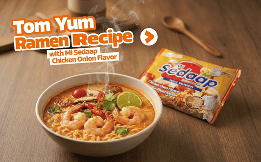A bowl of Thai style Tom Yum ramen made with instant noodles, shrimp, squid, tofu, and fresh cilantro in a spicy, sour aromatic broth, served as a quick seafood ramen and instant ramen upgrade.