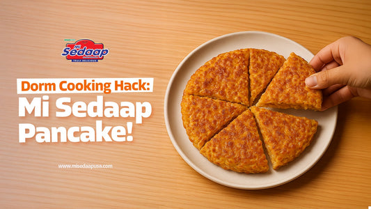 A promotional graphic featuring a sliced Mi Sedaap noodle pancake on a plate with the text "Dorm Cooking Hack: Mi Sedaap Pancake!"